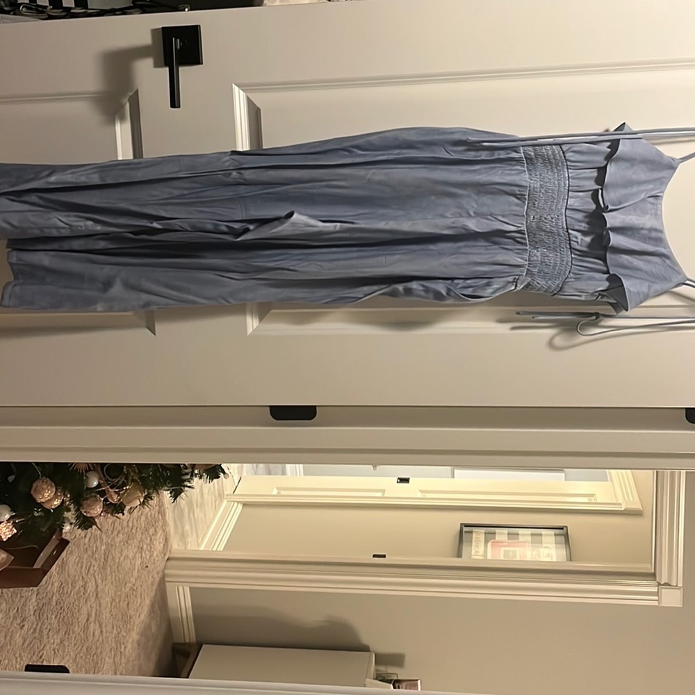 Light blue jumpsuit lightly worn